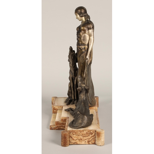 219 - After Georges Van De Voorde, Art Deco silvered and bronzed metal figure group, modelled as a lady wi... 