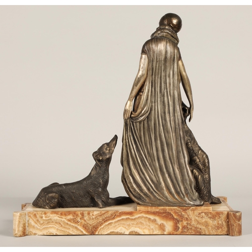 219 - After Georges Van De Voorde, Art Deco silvered and bronzed metal figure group, modelled as a lady wi... 