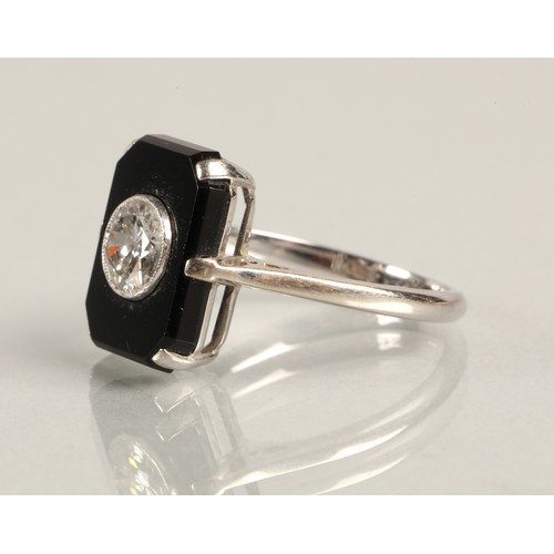 48 - Art Deco diamond solitaire ring, 0.75 carat stone, set in black onyx on white metal shank, ring size... 