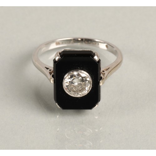 48 - Art Deco diamond solitaire ring, 0.75 carat stone, set in black onyx on white metal shank, ring size... 