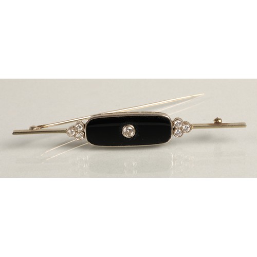 54 - Art Deco 18ct white gold diamond bar brooch, 0.2 carat diamond set in black onyx flanked by a trio o... 