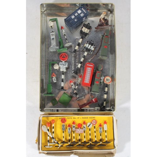 106 - Tin containing die-cast models and accessories to include Dinky Toys No.47 Road signs in original bo... 