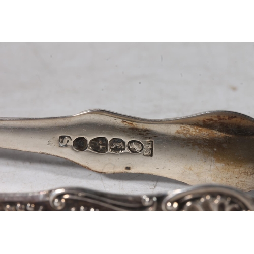 113 - Pair of Victorian hallmarked Chester silver sugar tongs.