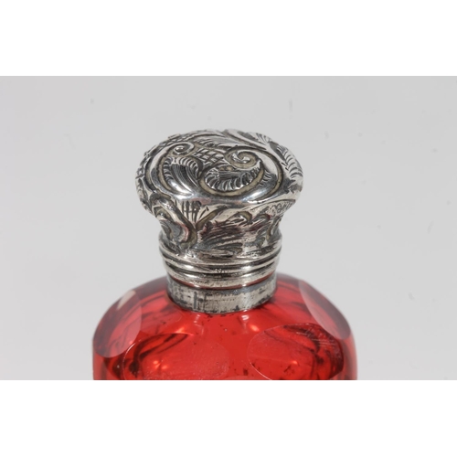 120 - Victorian ruby glass and silver top scent bottle.