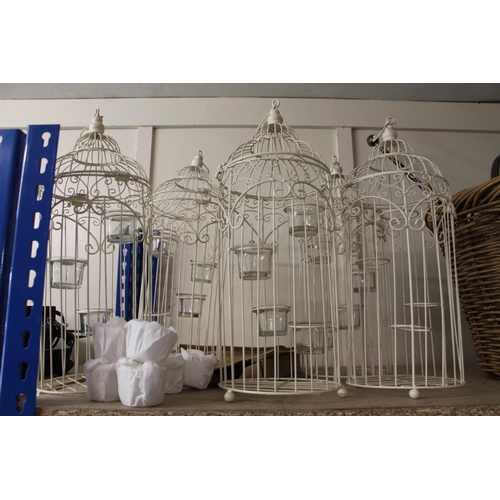 159 - Set of five hanging metal framed candleholders in bird cage form, etc.