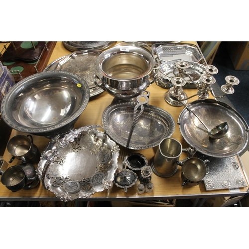 202 - Collection of silver plate including ice buckets, candleholders, etc.