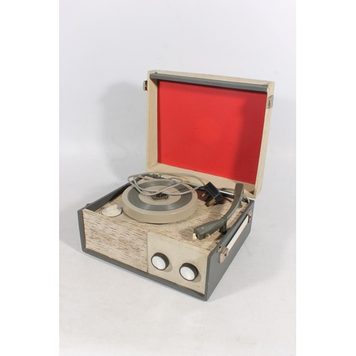 274 - Compact portable record player.