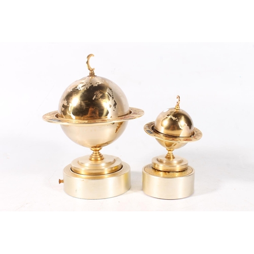 91 - Retro mid-20th century globe form musical cigarette dispenser and a globe form musical table lighter... 