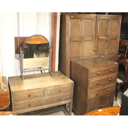 672 - Mid 20th century oak three piece bedroom suite.