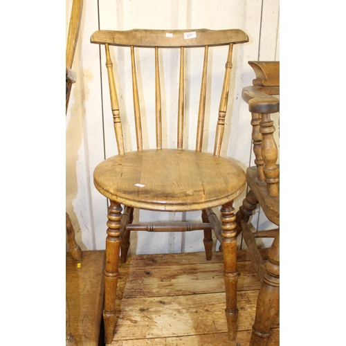 677 - Farmhouse style spindle back chair.