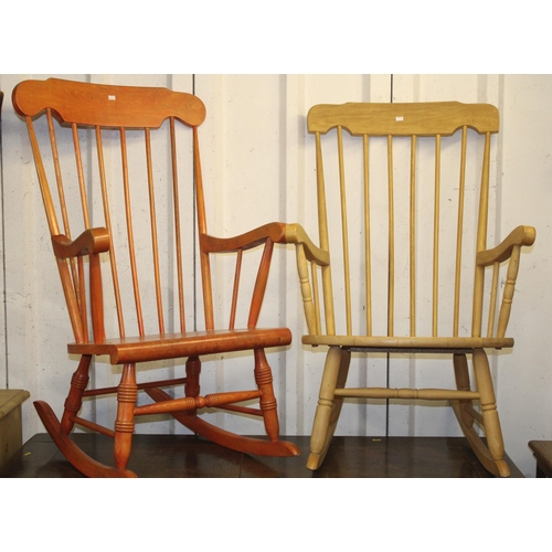 688 - Near pair of spindle back rocking chairs.