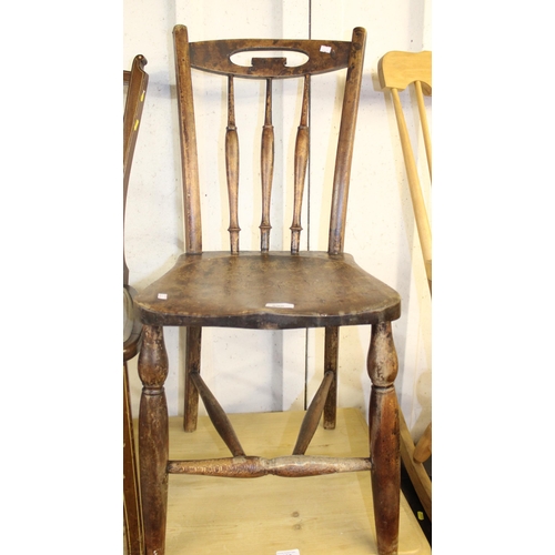 690 - Farmhouse style spindle back armchair.