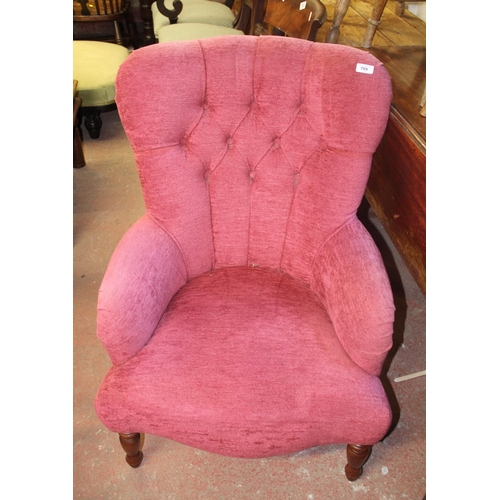 709 - Button back pink upholstered armchair.