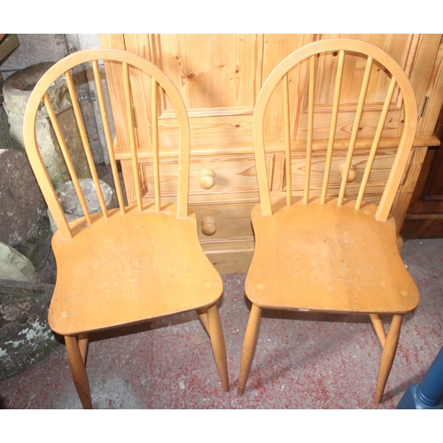 728 - Pair of spindle back dining chairs.