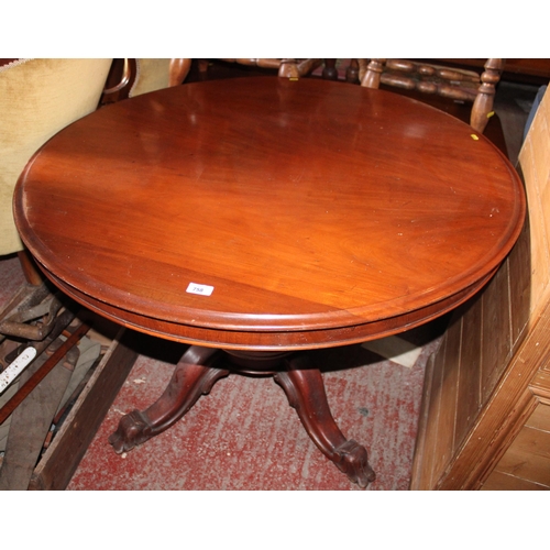 758 - Round topped mahogany dining table.