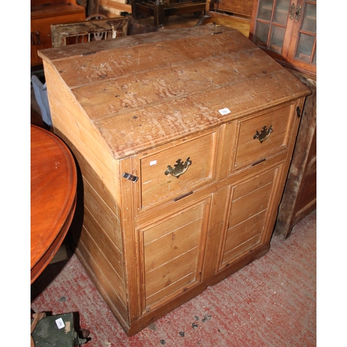 759 - Slope front pine storage chest.