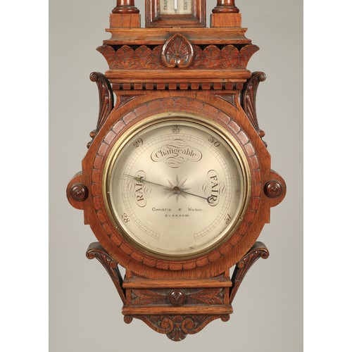 179 - Carved oak barometer, 100cm long.