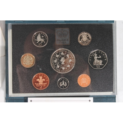 215 - UNITED KINGDOM eight coin proof year set 1993, £5 coin 2006, and a group of first day covers.