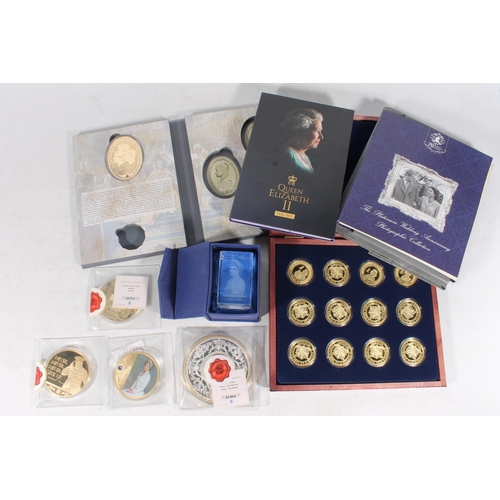 217 - Jubilee Mint, a set of 12 'In Memory of Queen Elizabeth II', medallions cased, a Princess Diana glas... 