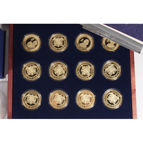 217 - Jubilee Mint, a set of 12 'In Memory of Queen Elizabeth II', medallions cased, a Princess Diana glas... 