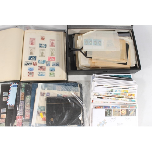 227 - Stamp collection held across and album and loose, mostly 20th century used stamps, also first day co... 