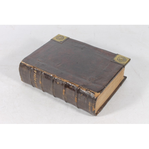 235 - Prince James bible circa 1621 in brass and brown leather binding.