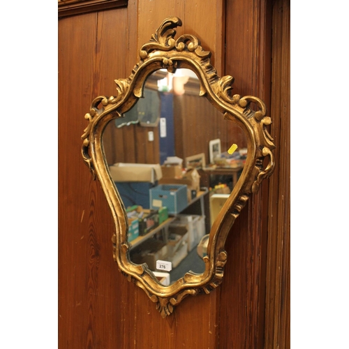 276 - Ornate gilt frame wall mirror, H70cm.