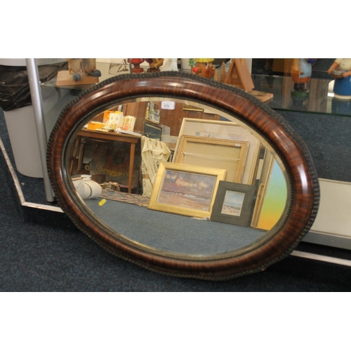 278 - Oval wooden framed wall mirror, W90cm.