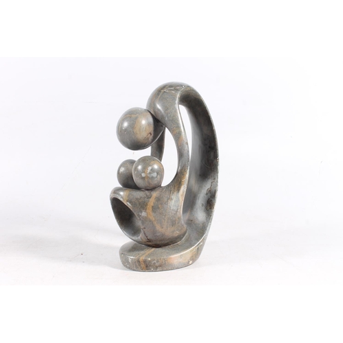 65 - Polished soapstone Modernist sculpture, 25cm high.