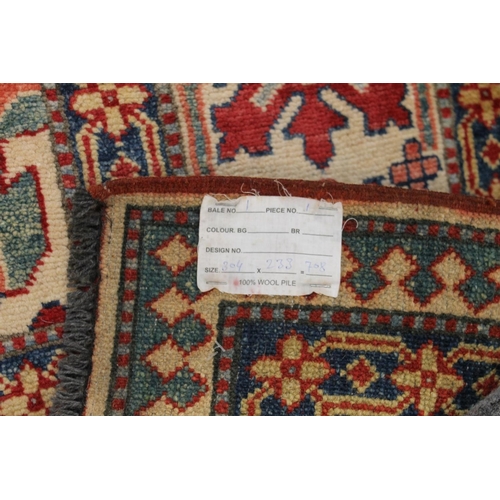 819 - Large rug, 308cm long