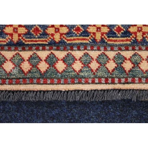 819 - Large rug, 308cm long