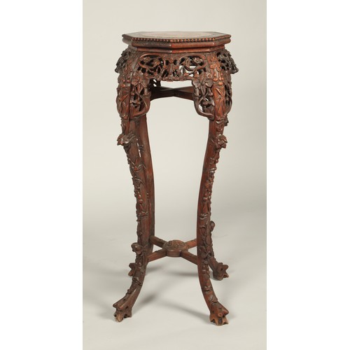 530 - Chinese hardwood jardiniere stand with octagonal top with rouge marble inset, with ornately carved a... 