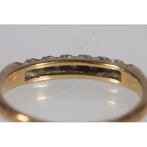 563 - 18ct gold and small diamond ring, size S/T, 2.9g.