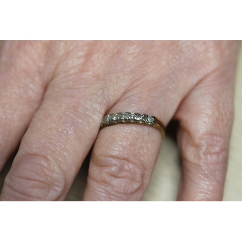 563 - 18ct gold and small diamond ring, size S/T, 2.9g.