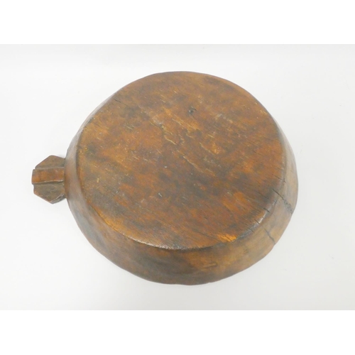 266 - Large carved wooden Indian Parat dough bowl with spout handle. Diameter 48cm. 