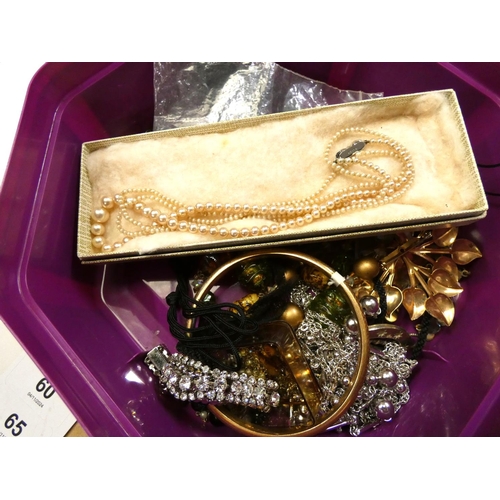 59 - Collection of costume jewellery including bangles, brooches, buttons etc.