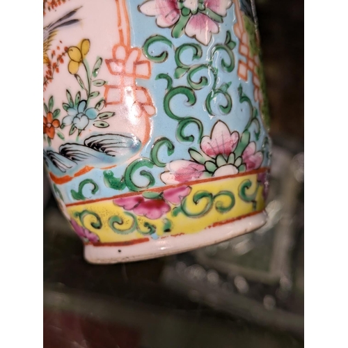 96A - Chinese Canton famille rose vase decorated with birds of paradise among trees and flowers, 18cm high... 