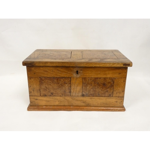 268 - Apprentice oak storage box with burr walnut panels. Height 17cm, Width 32cm, Depth 18cm.