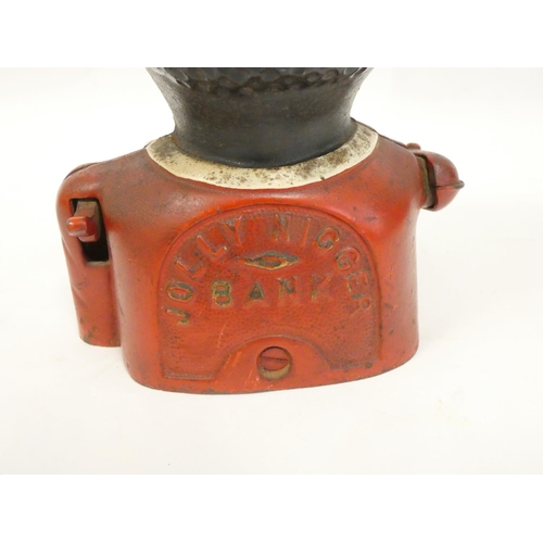 276 - 1930s painted cast iron blackamoor money box. Height 17cm.