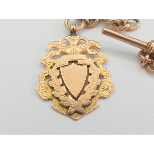 48 - 9ct gold watch fob on partial gold chain and a 9ct gold T bar. 12g 