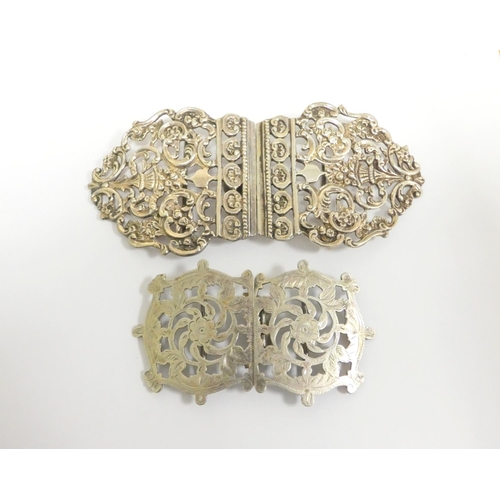 67 - Sterling silver belt buckle of pierced form by William Comyns & Sons, London 1910. Also ano... 