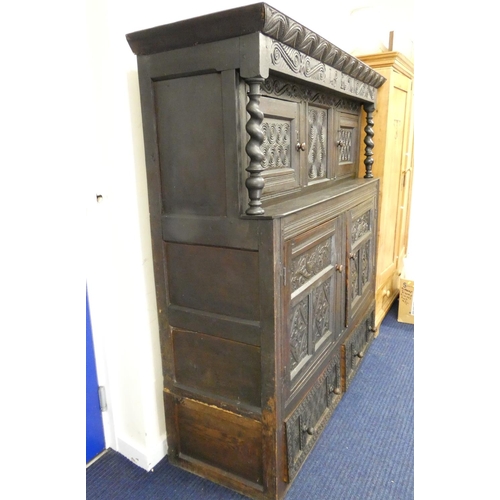 438 - Antique oak court cupboard the top bearing initials I.S and date 1696 above barley twist columns and... 