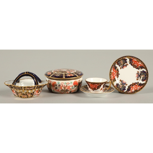 18 - Royal Crown Derby Imari pattern miniature tea cup, saucer and side plate, basket, and lidded pot