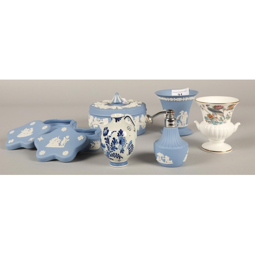 31 - Collection of Wedgwood blue jasper ware to include three boxes and covers, atomiser, vase etc