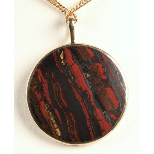 63 - Agate pendant mounted in 9ct gold, on a 9ct gold chain, chain weight 6.6g