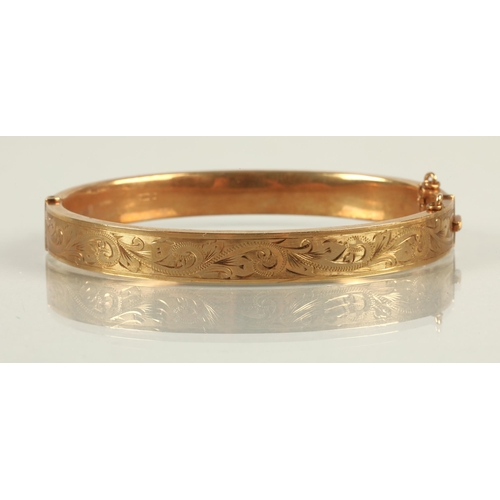 64 - 9ct gold stiff bangle, 14g