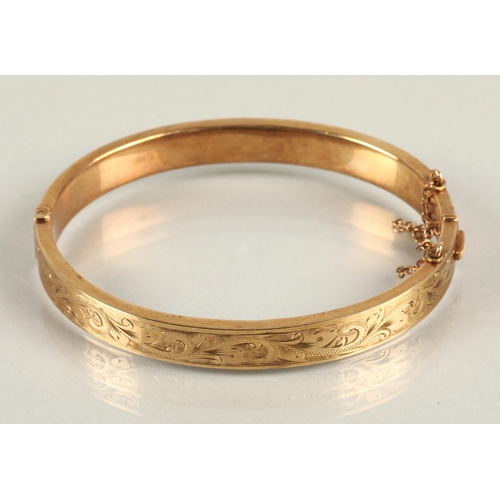 64 - 9ct gold stiff bangle, 14g