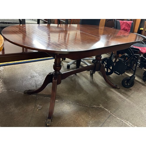 632 - Mahogany extending dining table