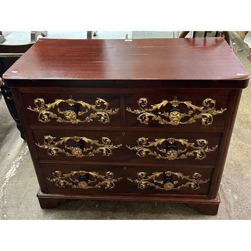 649 - Two over three mahogany chest with ornate gilt decoration 