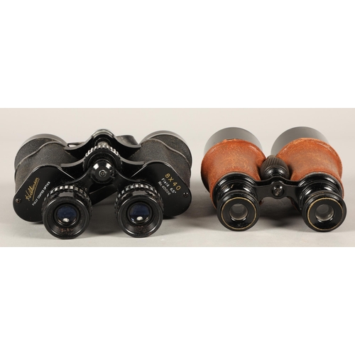 49 - Two cased sets of binoculars.